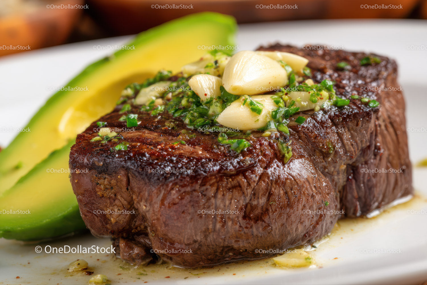 Juicy Grilled Steak with Garlic and Avocado for a Gourmet Meal