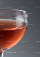 Close up of chilled rose wine glass with condensation