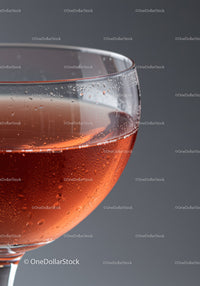 Close up of chilled rose wine glass with condensation