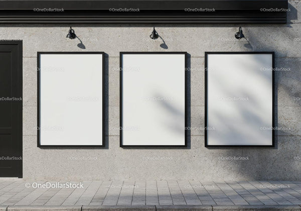 Three blank posters on modern concrete wall JPG Mockup Image
