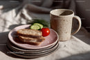 Rustic Breakfast Scene with Sliced Bread Cherry Tomato and Mug