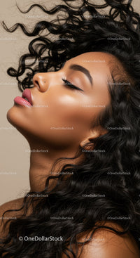 Profile of calm woman with curly hair and natural makeup
