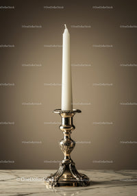 Elegant Silver Candlestick with White Candle on Marble Table