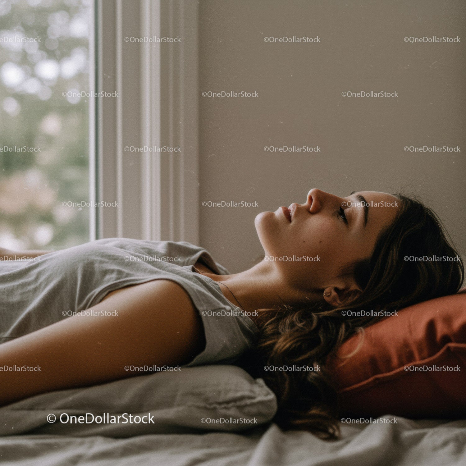 Relaxing Woman Lying on Bed in Calm Bedroom Scene