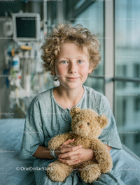 Child with Teddy Bear in Hospital Room Brightly Lit with Medical Equipment