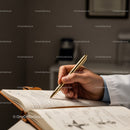 Close-up of a Doctor Writing Notes in a Medical Journal in a Clinical Setting