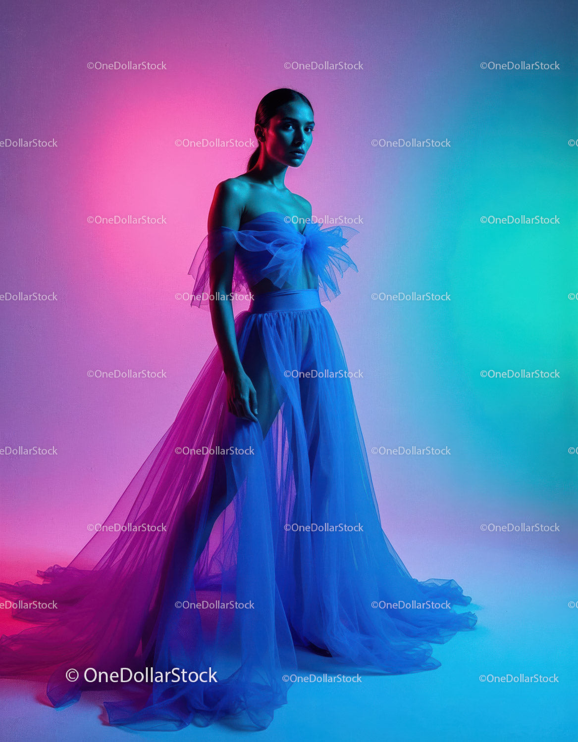 Elegant Blue Tulle Dress Surrounded by Colorful Artistic Lighting