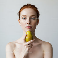 Portrait of a Young Woman with Red Hair Holding a Pear