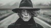 Stylish Young Man with Wet Hair Outdoors in Moody Black and White Portrait