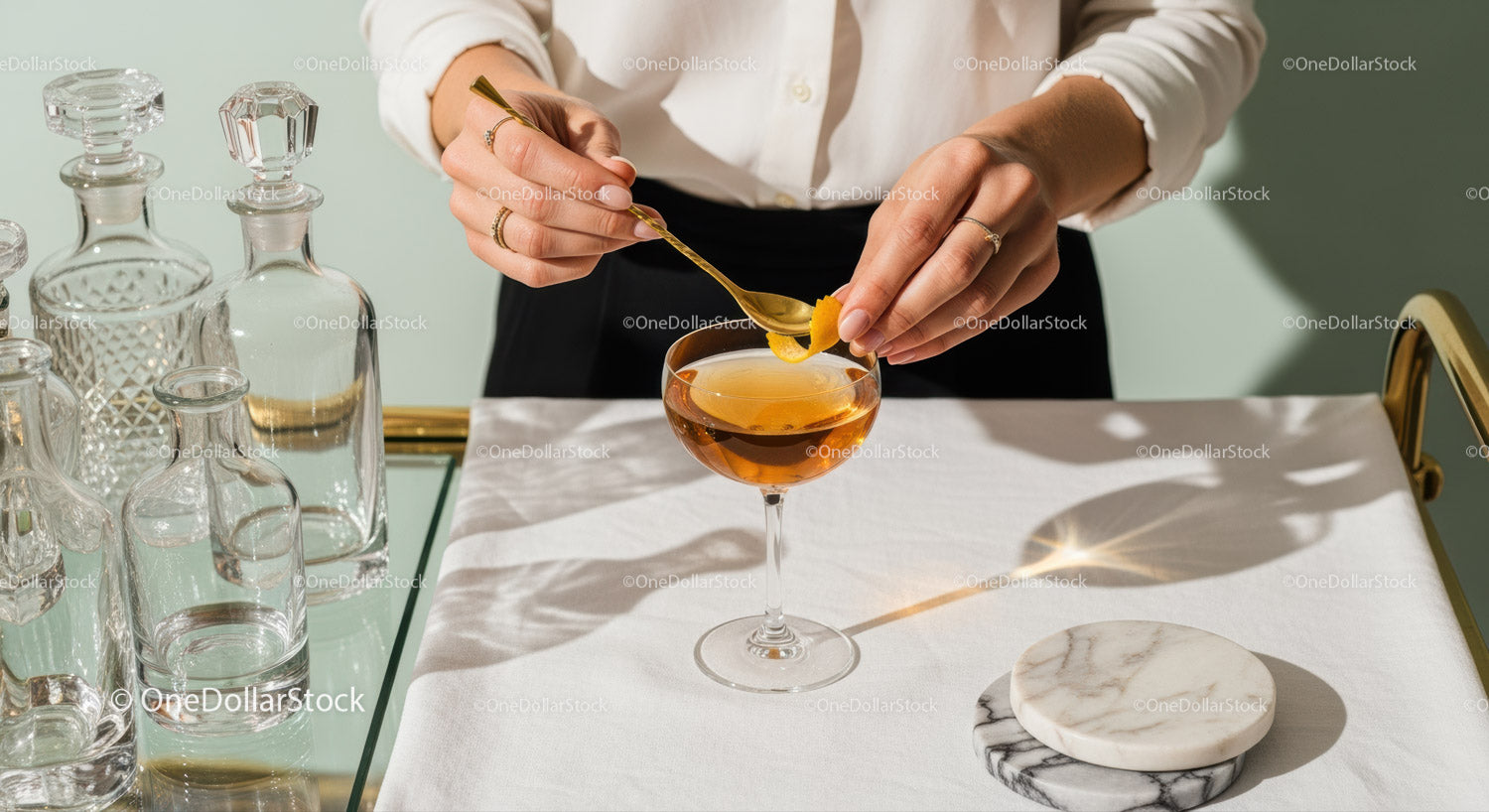 Elegant Orange Peel Gin Cocktail in Vintage Glass with Bar Accessories