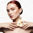 Elegant Woman with Pear in Artistic Beauty Portrait