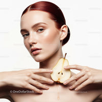 Elegant Woman with Pear in Artistic Beauty Portrait