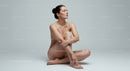 Peaceful woman meditating in serene minimalist space