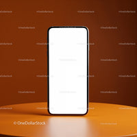 Modern smartphone with blank screen on orange surface