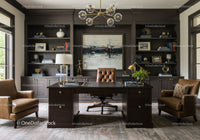 Elegant home office with leather chairs and dark wood desk