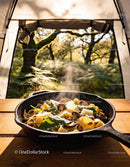 Steaming mushroom pasta served in cast iron skillet