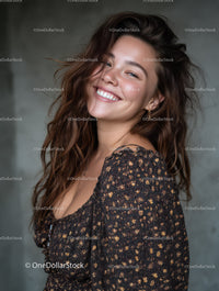 Happy Woman with Wavy Hair Wearing Floral Dress Smiling Portrait