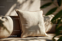 Elegant Beige Cushion on Sofa with Natural Light in Cozy Living Room