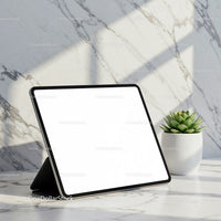 Digital Tablet with Blank Screen on Marble Surface