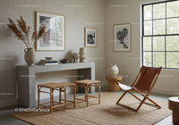 Minimalist living room with woven stools and leather chair