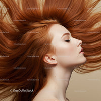 Profile of Woman with Flowing Red Hair in Soft Light