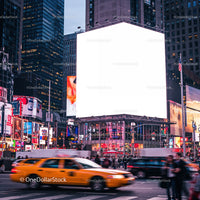 Busy Urban Intersection with Yellow Taxi and Bright Billboard