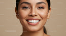 Close up of young woman smiling with flawless skin