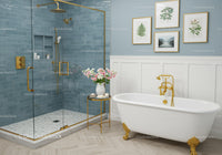 Elegant bathroom with white clawfoot tub and glass shower