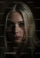 Close-up portrait of young woman with striking blue eyes