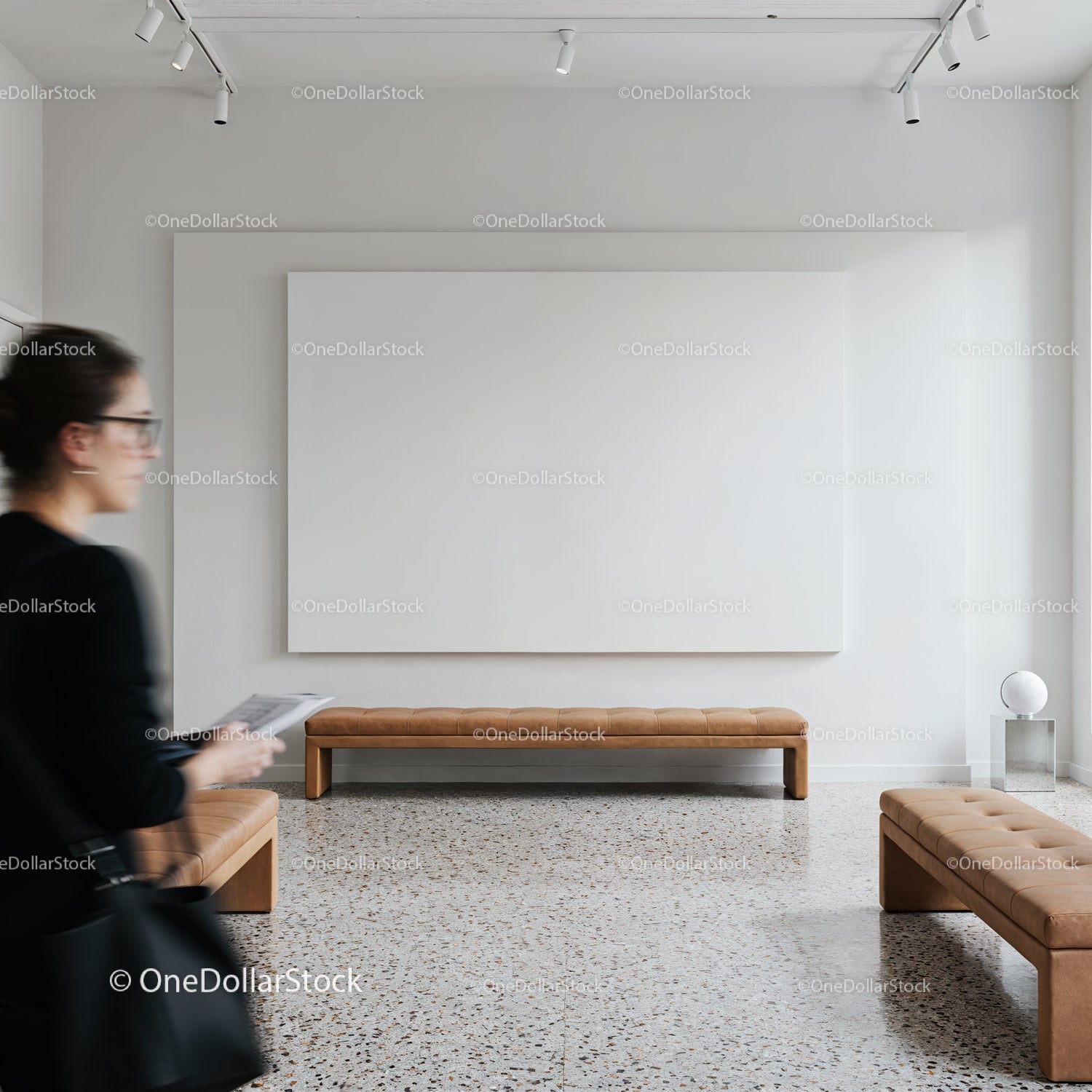 Woman Walking Through Minimalist Gallery Space with Benches