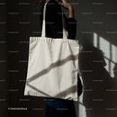 Woman Holding Plain Canvas Tote Bag in Natural Light
