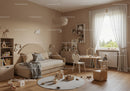 Cozy Children's Bedroom with Natural Light and Playful Decor