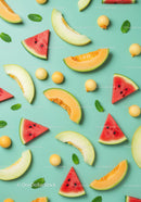 Fresh melon slices and watermelon on turquoise background