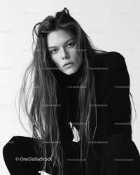 Black and White Portrait of a Young Woman with Intense Expression