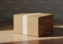 Simple cardboard package sealed with white tape on floor