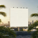 Large blank billboard on rooftop with city skyline