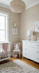 Bright Nursery Room with White Furniture and Plush Teddy Bear
