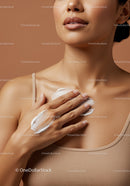 Close-Up of Woman Applying Moisturizer with Smooth Skin