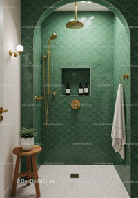 Contemporary green tiled shower with brass fixtures