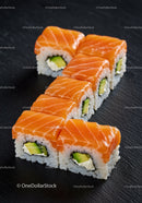 Fresh salmon sushi rolls with avocado and cream cheese