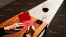 Handwriting a Romantic Love Note Beside a Glass of Red Wine