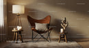 Cozy corner with leather chair and warm lighting