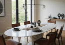 Elegant Modern Dining Room with Marble Table and Black Decor