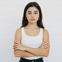 Young Woman Portrait with Crossed Arms and Confident Expression