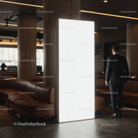 Modern lounge interior with illuminated advertising panel