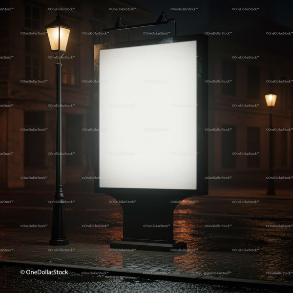 Illuminated billboard on rainy empty city street at night JPG Mockup Image