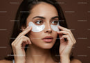 Young Woman Wearing Eye Patches for Skincare Treatment