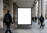 Blank urban billboard on busy pedestrian street