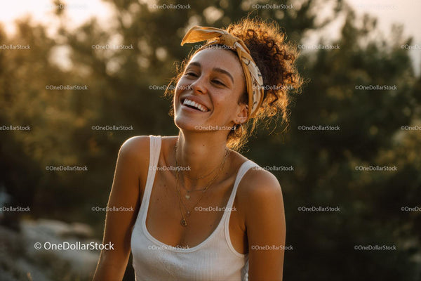 Joyful Woman Smiling Outdoors with Sunlight and Summer Fashion