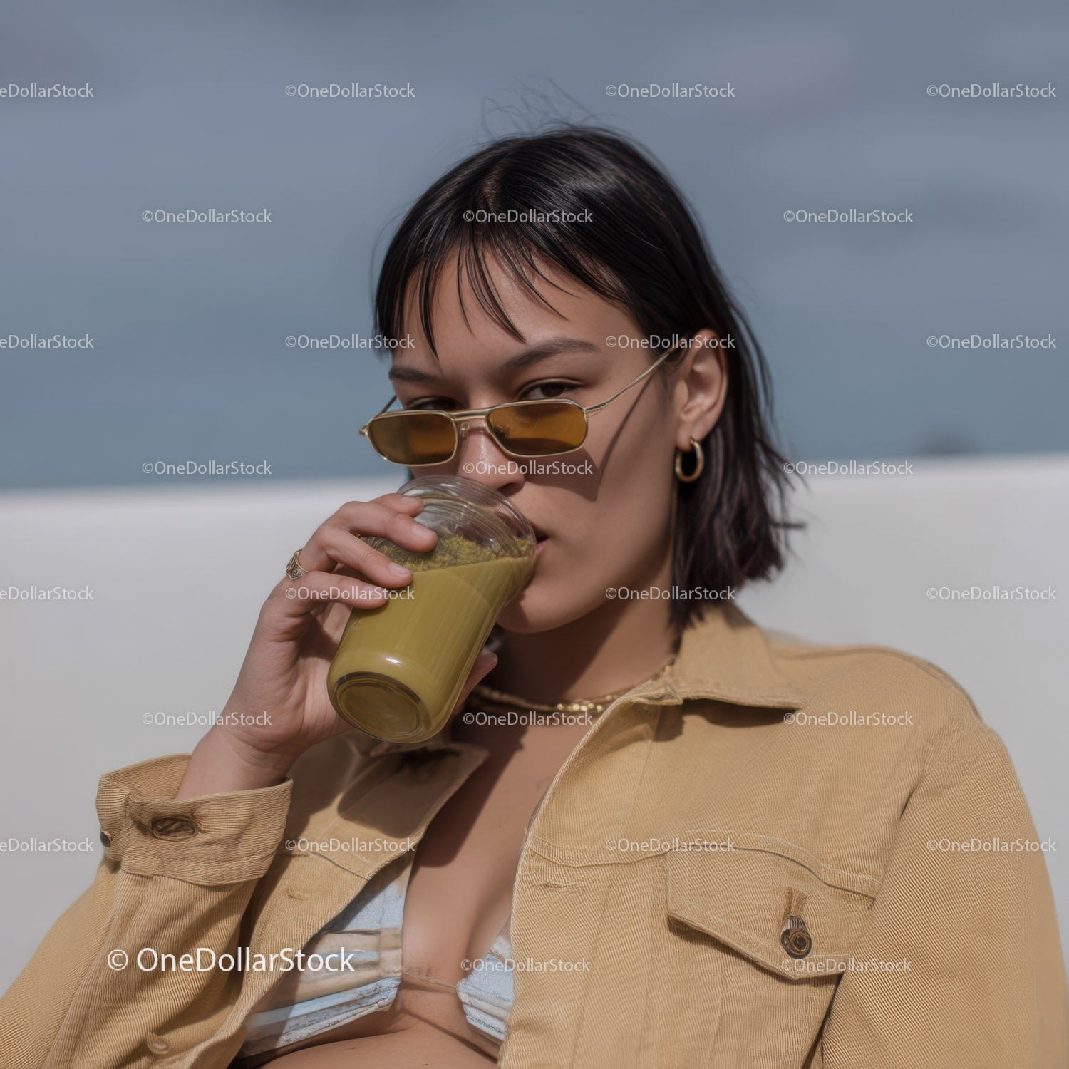Fashionable Woman Drinking Matcha Latte Outdoor Lifestyle Scene